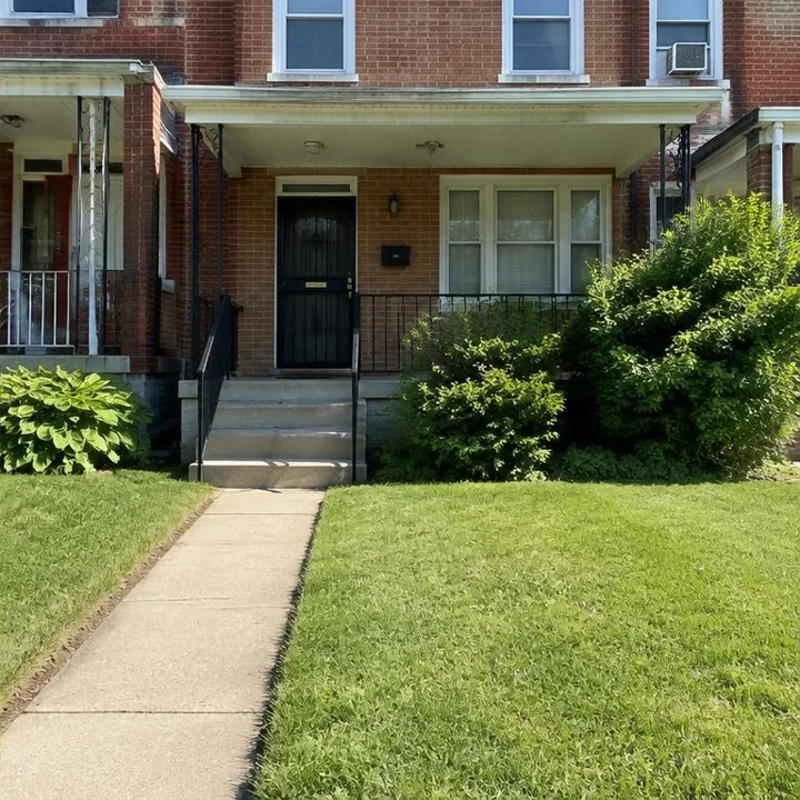 West Baltimore Rowhouse, lawn after illustrative maintenance